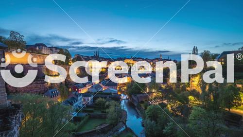 Grand Duchy Of Luxembourg Time Lapse 4K, City Skyline Day To Night Sunset Timelapse At Grund Along Alzette River In The Historical Old Town Of Luxembourg